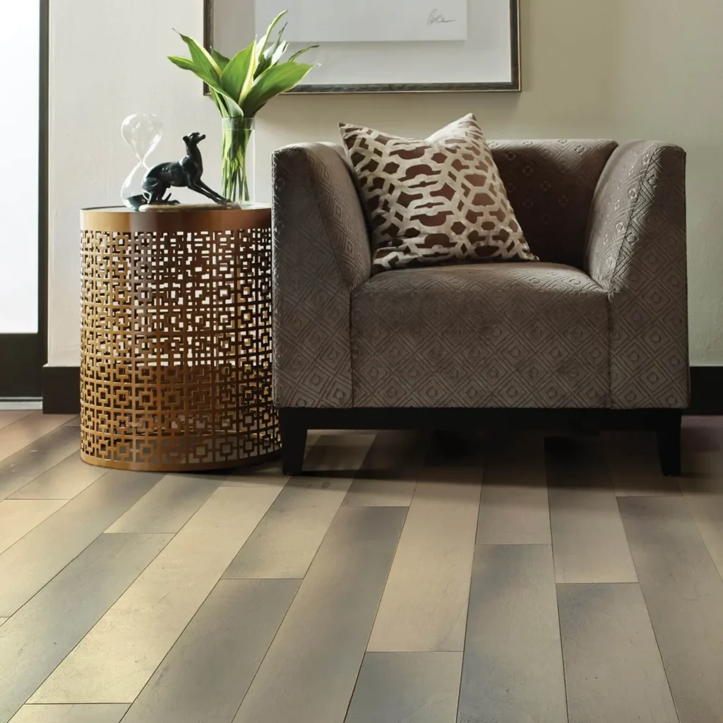 Hardwood flooring in sitting area with round side table